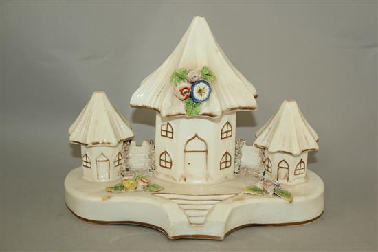 Three Staffordshire porcelain models of toll houses and another of a church, mid 19th century, height 11.5 - 18cm